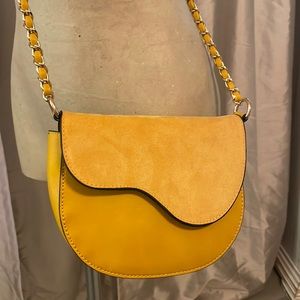 Crossbody bag with gold chain strap